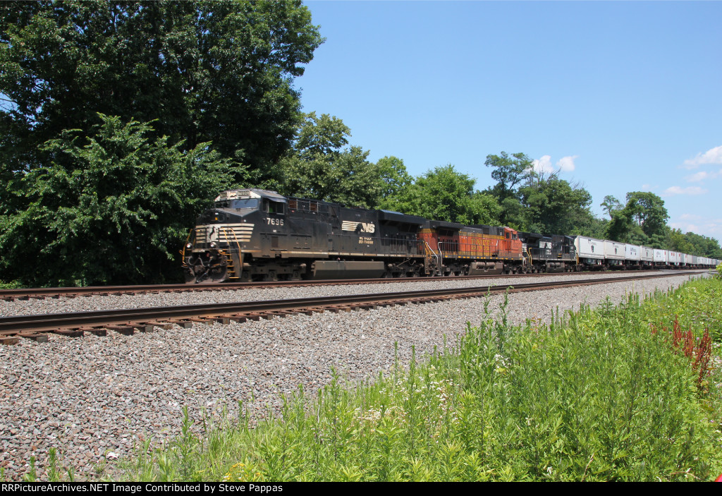 NS 7696 takes an intermodal train West at MP 116